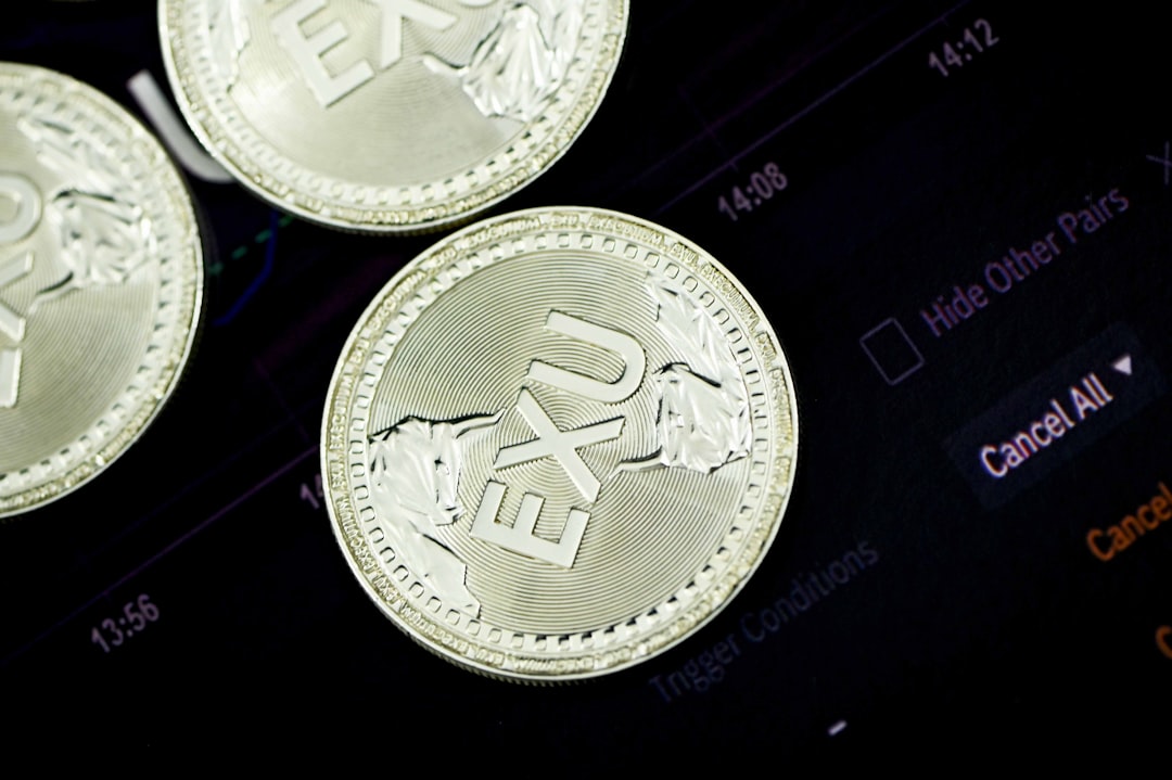 EXU coins placed on a trading chart